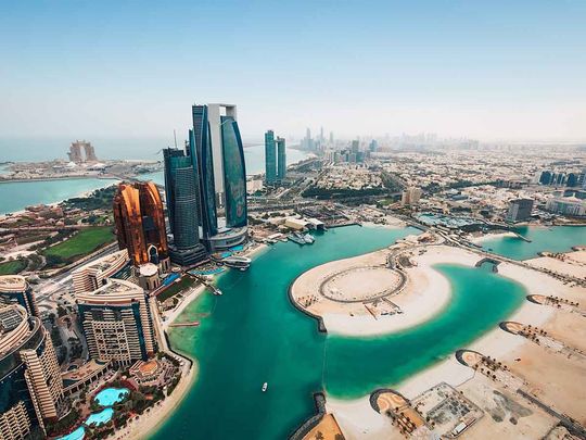 Rephrase the title:Abu Dhabi auctions off Dh3.4 billion of real estate through app