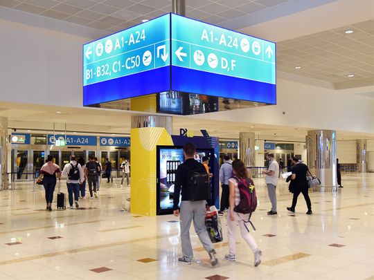 Rephrase the title:UAE rains: 13 Dubai-bound flights diverted to nearby airports amid unstable weather conditions