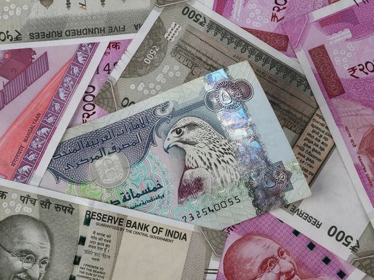 Rephrase the title:Sending money to India from UAE? Rupee remains nears all-time low of 22.71 to dirham